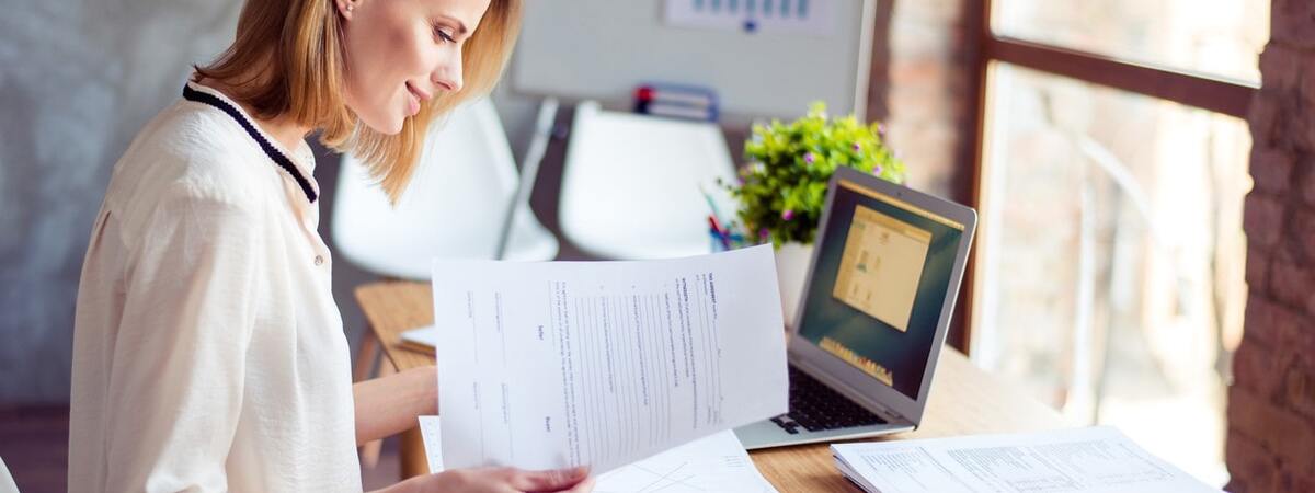 Image of blonde former teacher smiling, having found an alternative job